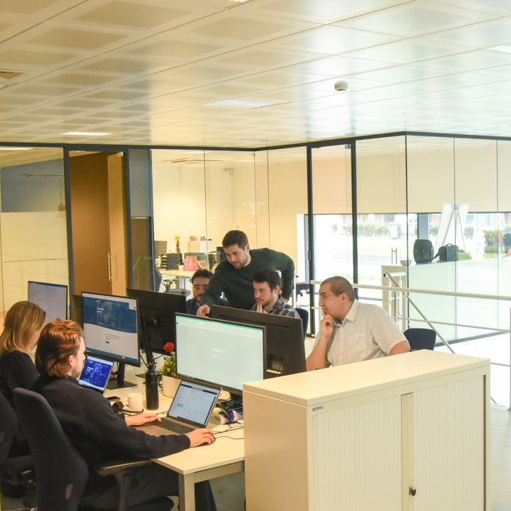people working at the banking services office